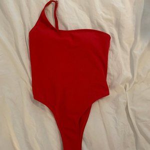 Red asymmetrical one piece